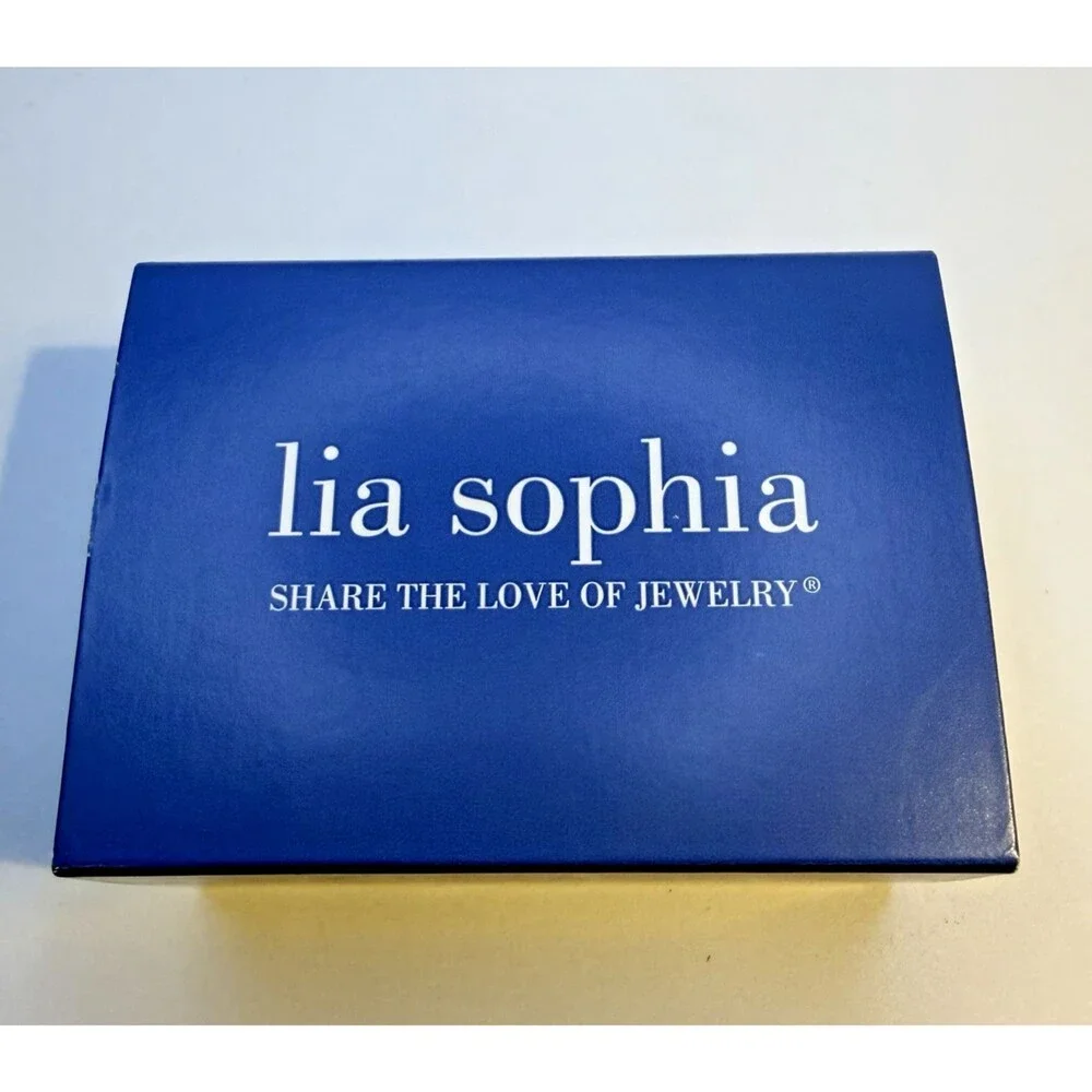 NIB Retired Lia Sophia On A Roll Ring 60693 Size 7 Silver Tone Wrap Spiral Ring